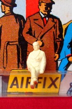 Sitting man with legs crossed