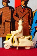 Man on Vespa scooter